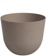 De Plantenbak Havanna Ø30cm x H25cm is een effen, ronde bloempot in lichtbruin met een gladde matte afwerking, licht uitlopende rand en minimalistisch design. De pot is leeg en ideaal voor moderne ruimtes.